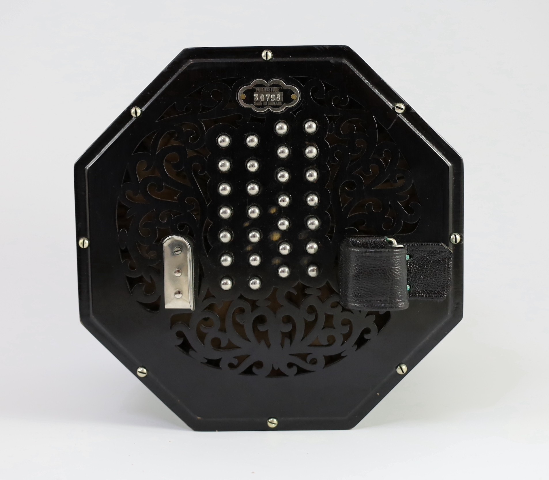 PLEASE NOTE 57 KEYS. A Wheatstone 'English' Model No. 5E 57 key concertina, diameter 17cm, with original leather case